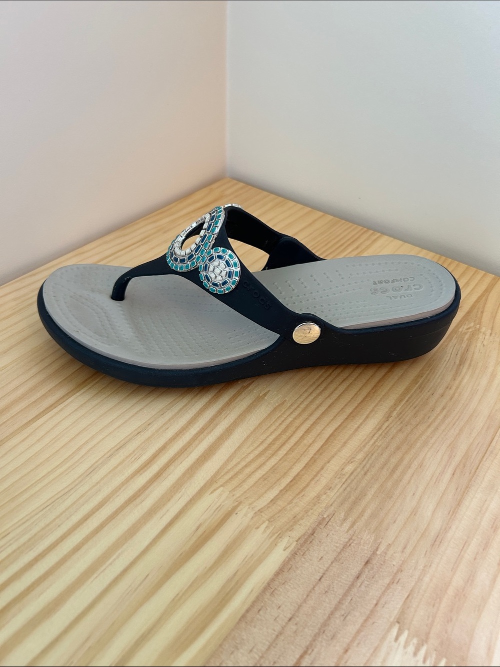 Crocs sandal in navy blue with blue, teal, and white detailing. - Picture 4 of 5